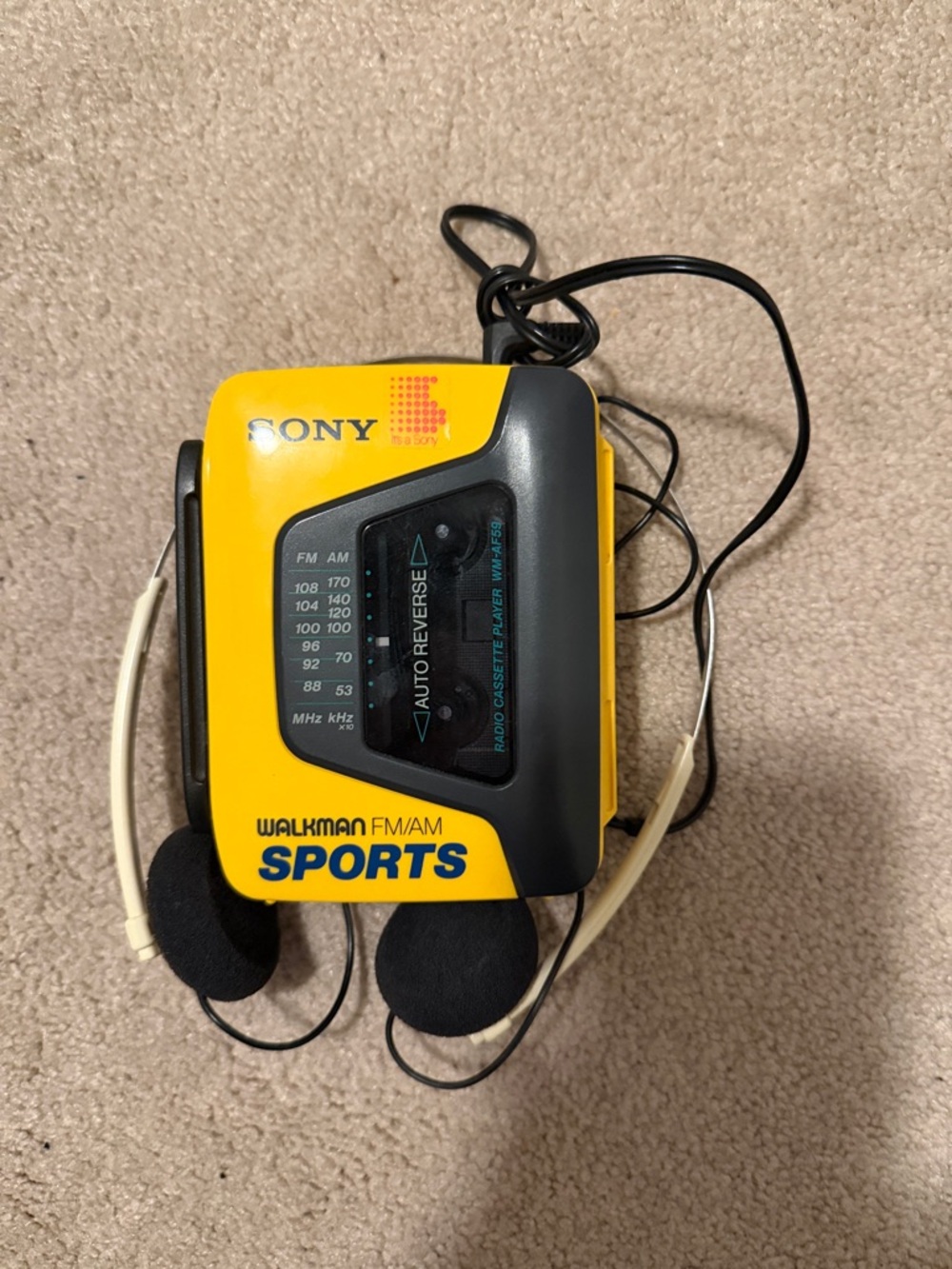 Vintage Sony Yellow and Black Walkman FM/AM Sports Cassette Player